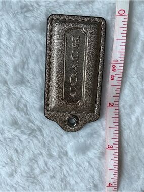 Coach Metallic Bronze Leather Bag Charm Tag
